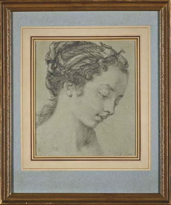 Head of a young woman in profile, looking down