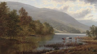 Cattle watering in a river landscape