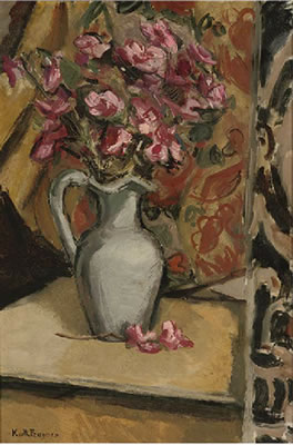 Pink roses in a porcelain jug, on a table