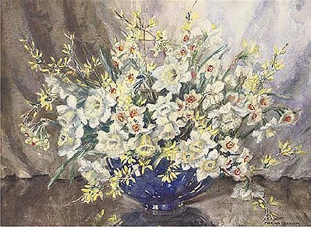 Daffodils and forsythia in a blue vase