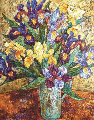 Assorted irises in a vase, on a table