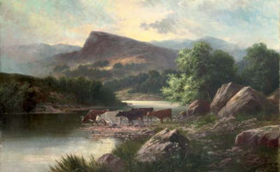 Cows watering in a mountainous river landscape