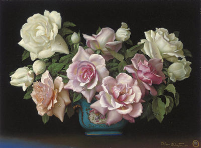 Mixed roses in a porcelain jardinière