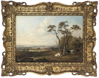 Cattle resting beside a cottage in an extensive landscape