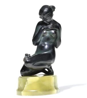 COLD-PAINTED BRONZE FIGURE modelled as a kneeling female nude with a frog resting on her knee