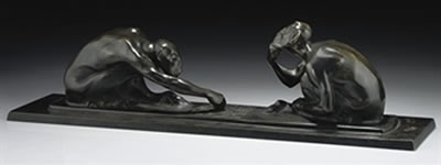A PATINATED BRONZE GROUP