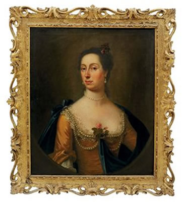 Portrait of woman traditionally identified as the sister of Samuel Cook (b. 1722), bust-length, in a golden silk dress and blue wrap, draped in pearls, a rose at her corsage, in a feigned oval