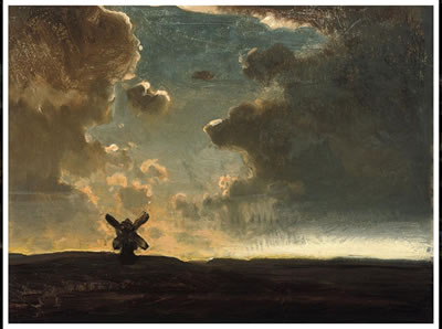 The windmill on the hill at dusk
