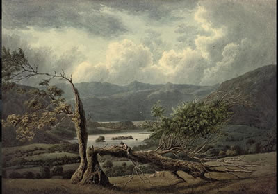 An extensive landscape in the Lake District with figures on a fallen tree in the foreground