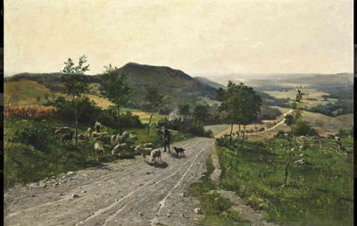 Shepherds making way on a country track