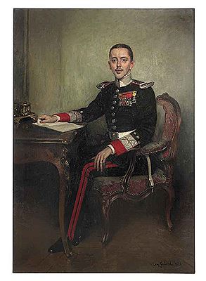 Portrait of a gentleman, full-length, seated, in uniform before a bureau plat
