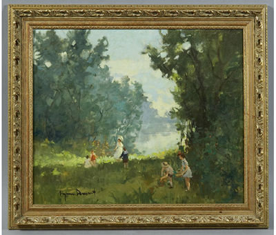 FAMILY PLAYING BY LAKE