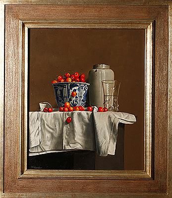 A still life of a bowl of cherries beside a ceramic vase, arranged on a white cloth