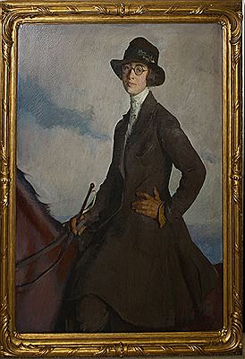 Portrait of a young woman on horseback