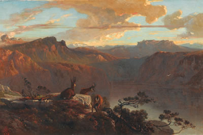 Alpseepanorama in der Morgendämmerung mit Gemsen