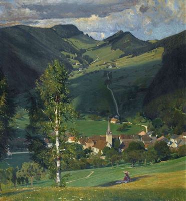 Weite Berglandschaft mit einem Dorf