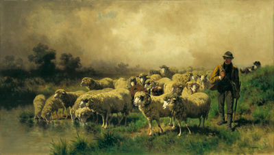 Shepherd with his herd of sheep