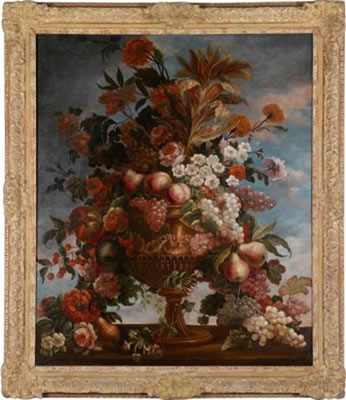 A splendid still life with flowers, grapes, peaches and plums in a metal vase on a stone parapet