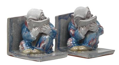 A pair of bookends featuring gnomes by Dina Kuhn - Auction record, sale price, and art valuation. Compare with similar artists and explore comparable artworks.