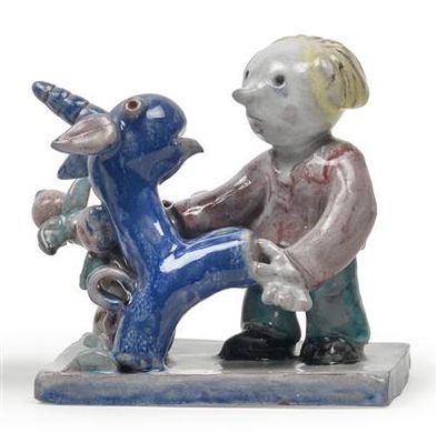 A male figure and a unicorn by a flowering tree