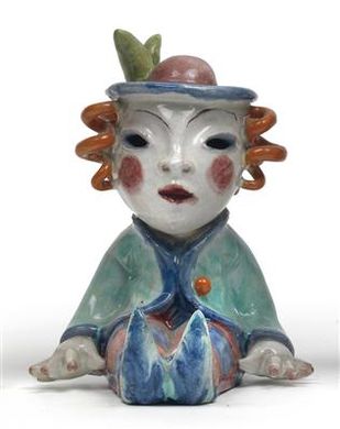 A seated male figure
