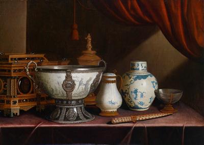 A still life including silver-mounted Chinese porcelain, a jewellery casket, and a tankard on a table
