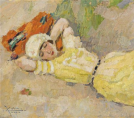 Fille couchée dans les dunes