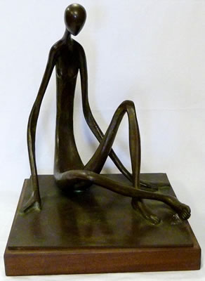 Figure depicting a man sitting.