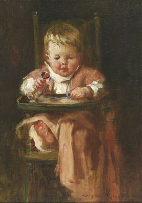Portrait of a seated child holding a rattle