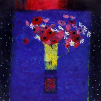 Vase of flowers on a blue surface