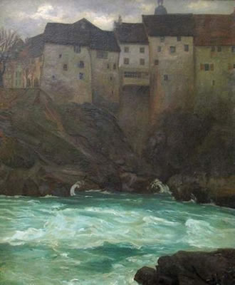 Blick vom felsigen Rheinufer aus auf Laufenburg