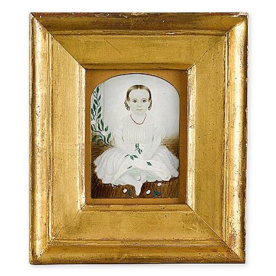 Miniature portrait of a young child in white dress holding a rose