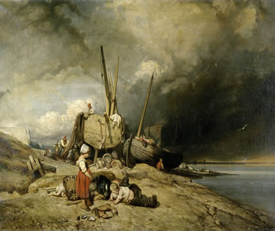 Fischer und Boote am Strand in der Normandie