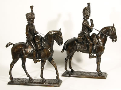 A PAIR OF BRONZES OF HUSSARS ON HORSEBACK