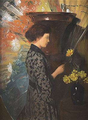 PORTRAIT OF A YOUNG WOMAN ARRANGING FLOWERS
