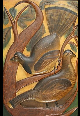 Outstanding relief carved plaque of two partridge on pine branches
