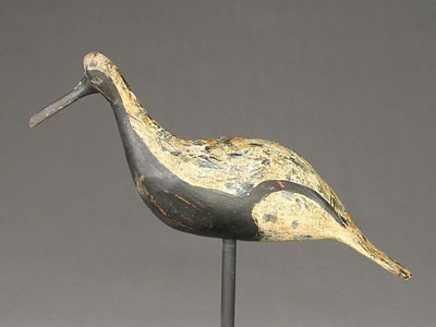 Well carved blackbellied plover with paddle tail