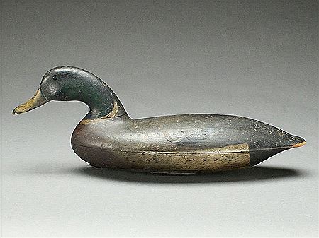 Extremely rare and important swimming mallard drake