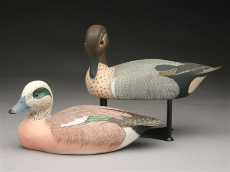 Two decorative carvings