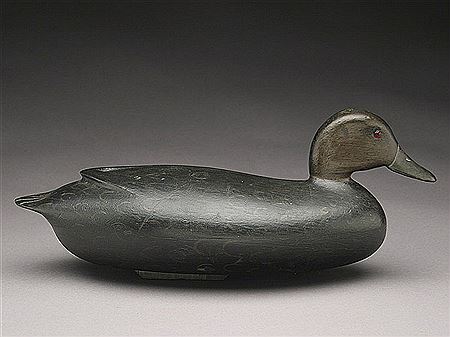 Hollow carved black duck