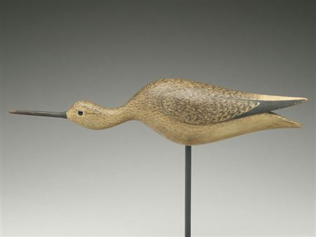 Hollow carved running yellowlegs