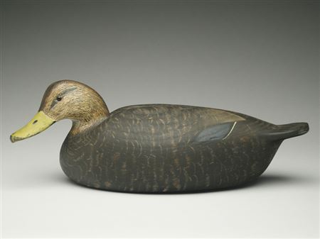 Large black duck carved from cottonwood