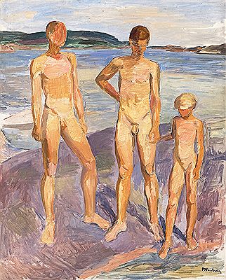 Two boys and a girl on a coastal rock