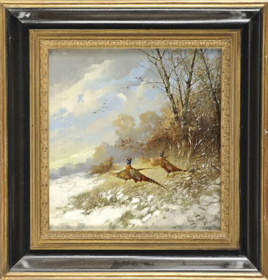 Pheasants in snowy landscape