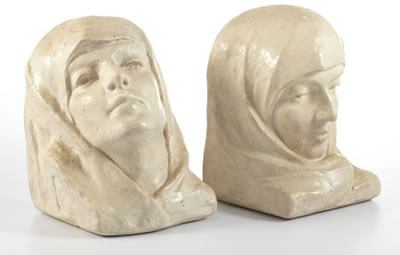 "Silence and Repose" A Pair of Painted Plaster Bookends, circa 1930