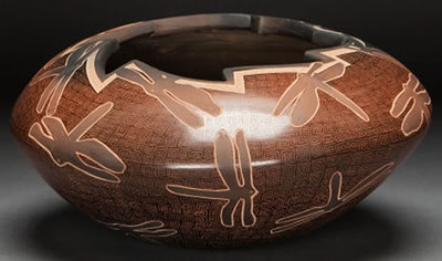 A SANTA CLARA ETCHED BROWNWARE JAR by Susan Folwell - Auction record, sale price, and art valuation. Compare with similar artists and explore comparable artworks.