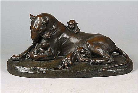 Lying lioness with three boys