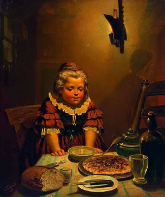 Mädchen beim Abendbrot im Kerzenschein
