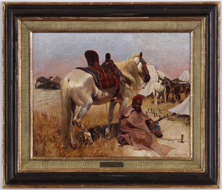 Cavalier arabe et son cheval au camp