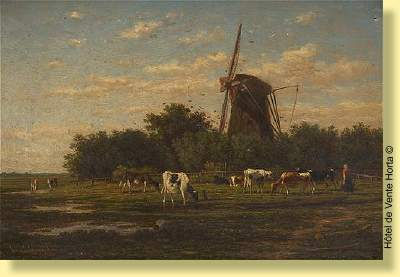 Troupeau devant un moulin